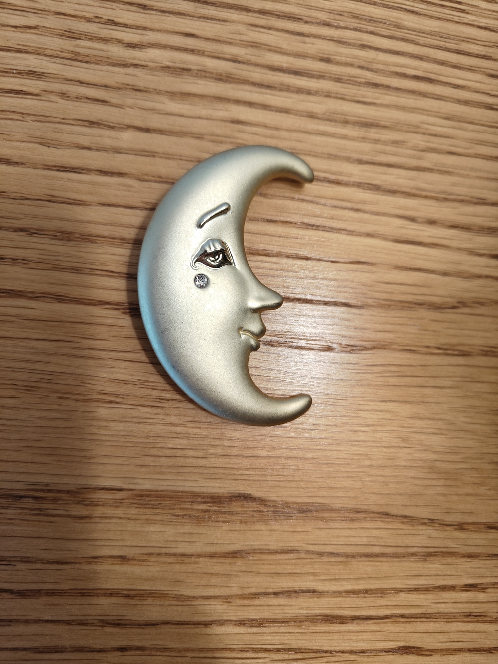 Vintage 1980's brush gold-toned "Man in the Moon" crescent profile pin